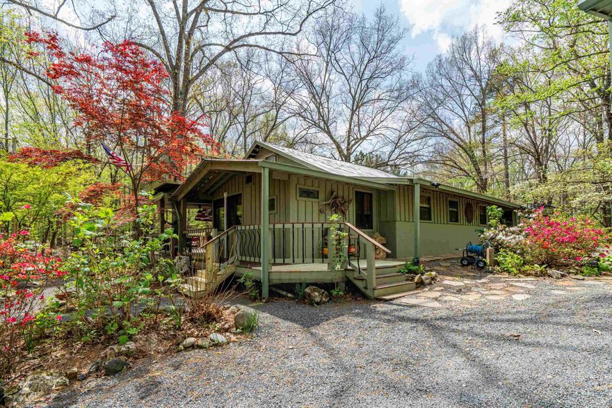 Private Retreat near Lake Ouachita. Situated on approximately 15 secluded acres and bordered by National Forest, this property offers unmatched privacy, peaceful surroundings, abundant wildlife for the outdoorsman, abundant hardwood timber, and natural creeks -perfect for those seeking a true escape to nature. The main home features 2 bedrooms and 2 bathrooms, offering a comfortable and functional layout with plenty of room for entertaining. A greenhouse provides space for year-round gardening, while the workshop and garage give you plenty of room for storage, projects, boat storage, or outdoor gear. In the garage, you’ll find a 1 bedroom, 1 bathroom apartment - ideal for guests, or a private getaway. Located just 6 miles from multiple Lake Ouachita resorts, you’ll enjoy quick access to boating, fishing, and recreation while still having the seclusion you crave. Whether you’re looking for a full-time residence, weekend getaway, or investment opportunity, this property checks all the boxes.