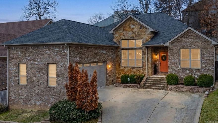 Discover modern luxury at this 2016-built gem in the established Villages of Wellington community. This West Little Rock home features a one-story open floor plan with hand-scraped hardwood floors and vaulted ceilings in the living and dining area that includes a fireplace and large island with slab granite countertops. The massive primary suite is a true sanctuary, boasting hardwood flooring, a spa-like bath with a soaking tub, dual vanities, and a generous walk-in closet. Guests will appreciate the comfort of brand-new carpet in the secondary bedrooms. Outdoor living is a dream on the private covered back patio featuring upgraded stamped and stained concrete. Complete with a spacious side-load garage, this home offers both style and function on a private cul-de-sac. Residents enjoy premier neighborhood amenities, including a pool, tennis courts, and playground. Positioned perfectly near The Promenade at Chenal, you are just minutes from the best the area has to offer. Enjoy your weekends with a stroll to the nearby pond, local shopping and dining, or relaxing on your private patio.