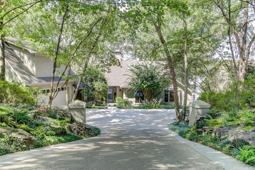 This custom built, 3854 sq ft, 3 bed, 3.5 bath home on Lake Hamilton has been meticulously maintained by the same family since it was built and is ready for a new owner. All 3 bedrooms are suites with private patios, sitting areas, and walk in closets. With North/South exposure on the lake, this home is protected from that brutal morning and afternoon sun. In addition to the home, nestled in exquisite landscaping for privacy, this property comes with 2 entire lots across the street complete with a fenced/gated 40'x80', 3200 sq ft, 1.5 bath building with air conditioned office and heated shop. What more could a family need?! Make your appointment to view this spectacular property today before it slips away. Square footage listed includes both house and shop.