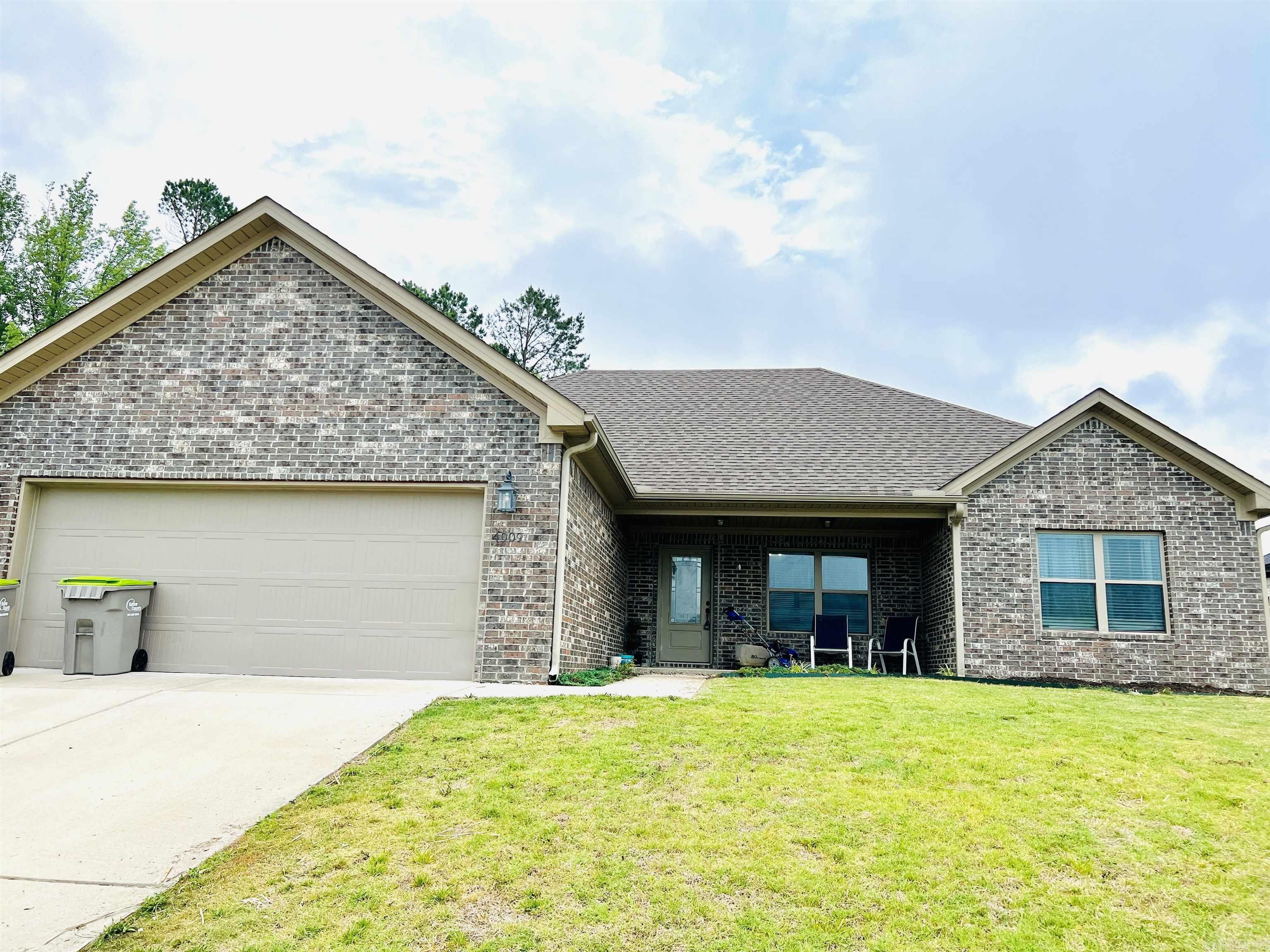 Spacious three bed, two bath in Bryant School Zone! Enter to large, bright den with luxury vinyl flooring. Open floorplan. Chefs kitchen with granite, stainless, and nice dining area. Walk in pantry! Bar seating for 3. Split floorplan with large master. Bath with tub, separate vanities and walk in shower. Nice master closet. Coat nook by garage door. Huge backyard perfect for any sized pup!