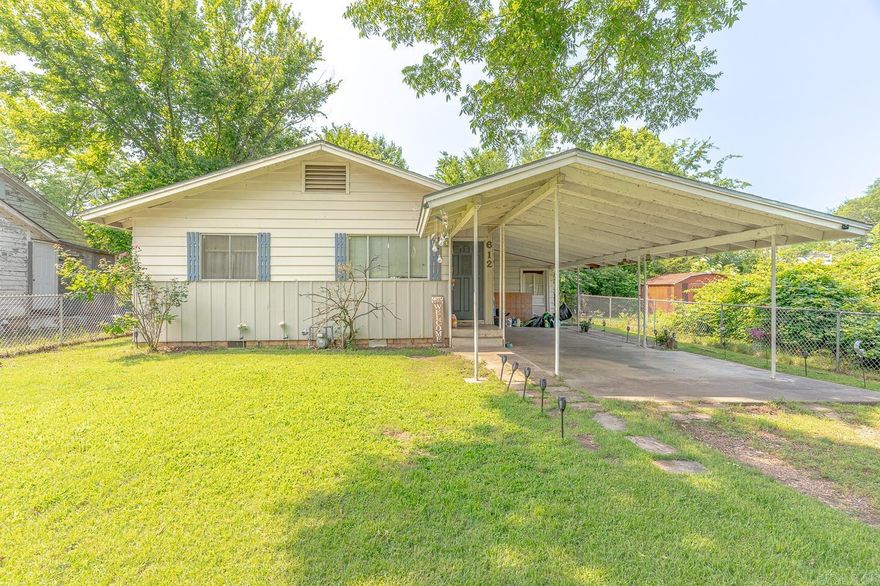 Welcome to Market 612 East E St. of Russellville, AR!! Don’t miss this well-maintained 3 bedroom, 2 bathroom home located just 3 minutes from Arkansas Tech University!! This home is packed with recent upgrades, including an HVAC unit, lighting, and bathroom vanity. The roof is 3 years old. This inviting property features a large living room perfect for relaxing or entertaining. The eat in kitchen is equipped with new appliances and offers plenty of space for cooking and gathering. The fully fenced-in yard is ideal for pets, play, or gardening. The outbuilding is great for storage, a workshop, or a hobby space. Conveniently situated close to campus, shopping, and dining this property is perfect for your next home or next investment property for your portfolio. Don't miss out, schedule your tour today!!