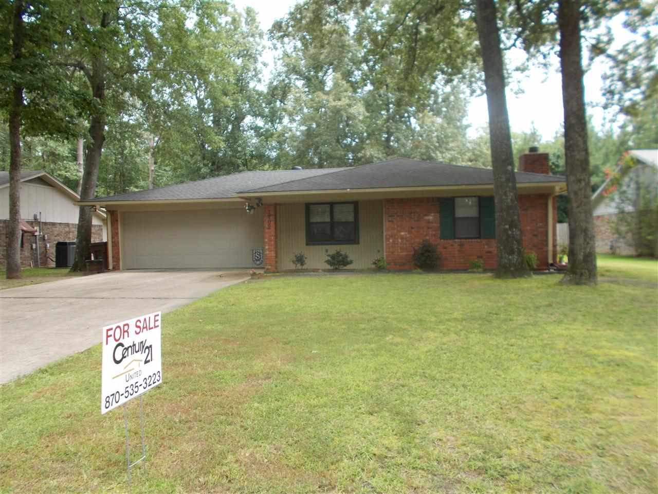 Picture perfect home that has been completely remodeled. Beautiful new laminate floors, carpet and ceramic tile throughtout. New kitchen countertops, stainlessd appliances, light fixtures and fans. Three bedrooms, two baths and den with fireplace. Roof and gutters are also new. You must see this one, it won't last long!