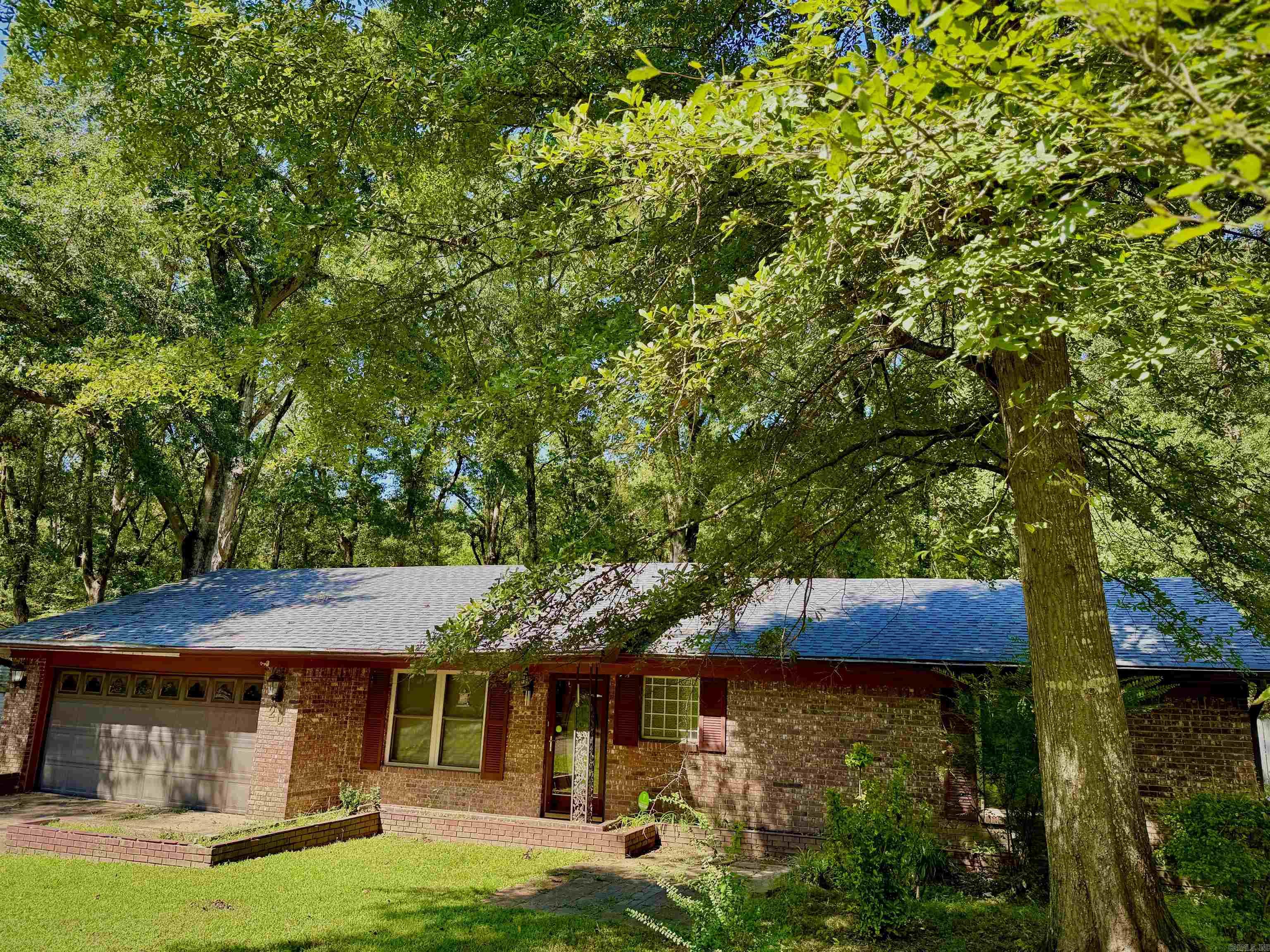 Peaceful living sound good? This home is near the end of the road, on a shaded lot, with an outdoor storage building, new roof, and a inground pool. Add your personal touches and updates! Call today for you private showing.