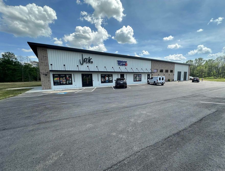 This 12,000 sqft commercial building sits on 13.94 +/- acres. Located on Highway 64 in Beebe, this property has great visibility and high exposure to traffic. Building constructed in 2024. The building offers flexible use while having plenty of room for expansion. This is a great opportunity to grow your business, don't miss out!
