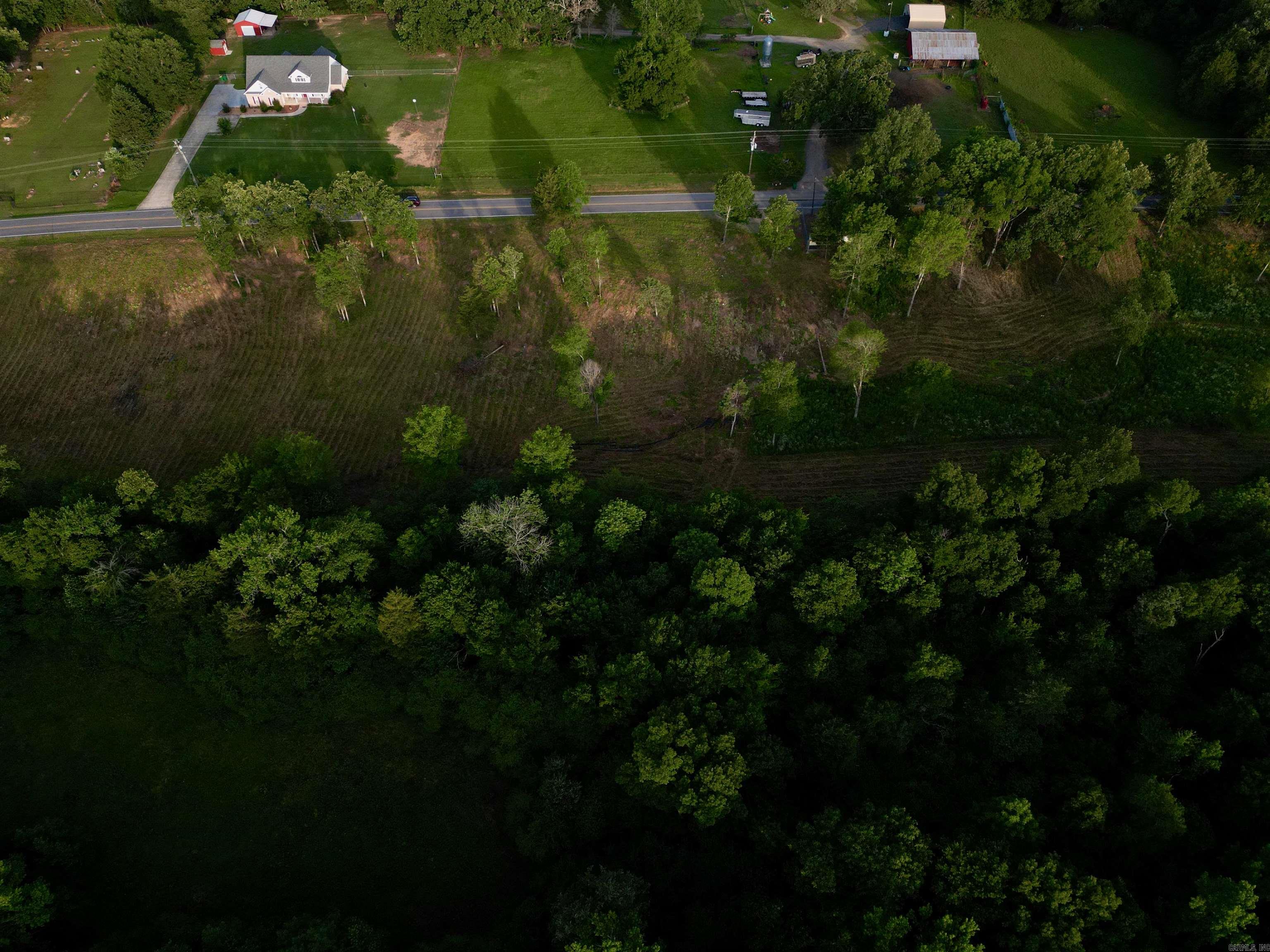 If youāve been searching for the perfect piece of land to create your dream home or your next investment, look no further than this 7 +/- acre tract located on Fortson Road. This property offers a unique blend of rural charm and modern convenience, making it an ideal canvas for your vision. One of the standout features of this property is its accessibility to essential utilities. Rural water and electricity are conveniently available at the road, ensuring that you can easily implement your plans without the hassle of extensive infrastructure work. The land is mostly cleared, revealing a mix of rolling and level terrain that adds character and versatility to the landscape.Rural water at the road -Electricity at the road -Mostly cleared -Rolling/level -1,285 +/- ft. road frontage on Fortson Rd -205 +/- ft road frontage on Dorsey Rd -12 miles to Cabot -8 miles to Vilonia -14 miles to Jacksonville -20 miles to Little Rock -20 miles to Conway