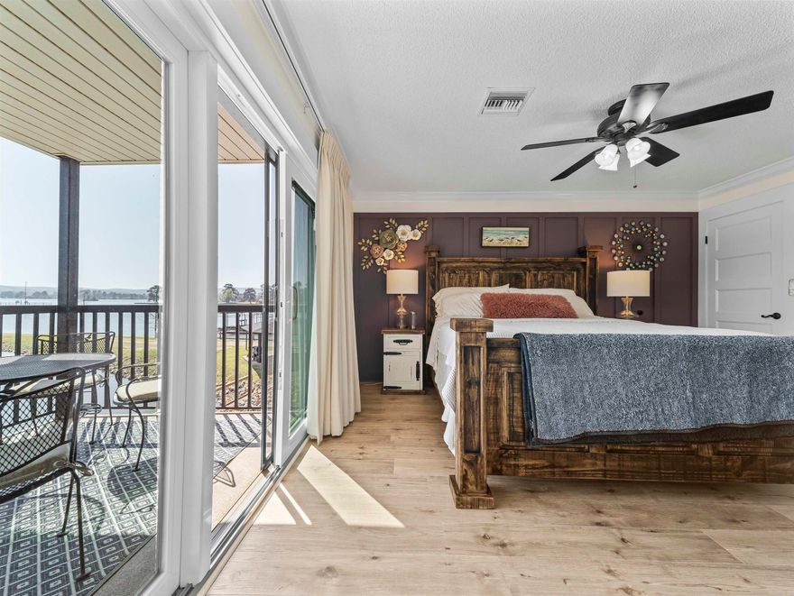 Welcome to the most fabulous lakefront condo on the market! Emerald Isle is a unique lakefront community with INCREDIBLE amenities, and this newly-renovated, fully-furnished condo is the place where lake lifestyle dreams come true. Just 8 stairs to reach the front door, you enter into a light-filled space with luxury finishings throughout- waterfall countertop, new luxury vinyl floors, custom tiled bathrooms, light fixtures, and more. The views from your private balcony are just breathtaking! A stroll down Emerald Isle's private peninsula takes you to to the private beach, mini golf, tennis court, sand volleyball, and basketball court. The swimming pool and hot tub (located just outside the clubhouse) were recently renovated and have a dog run and grilling area for even more recreation and entertainment. At just $250/month, all of these amenities come with one of the lowest POA fees on Lake Hamilton. Make 2026 the year you chose to embrace all that Lake Hamilton has to offer. Schedule your showing today!