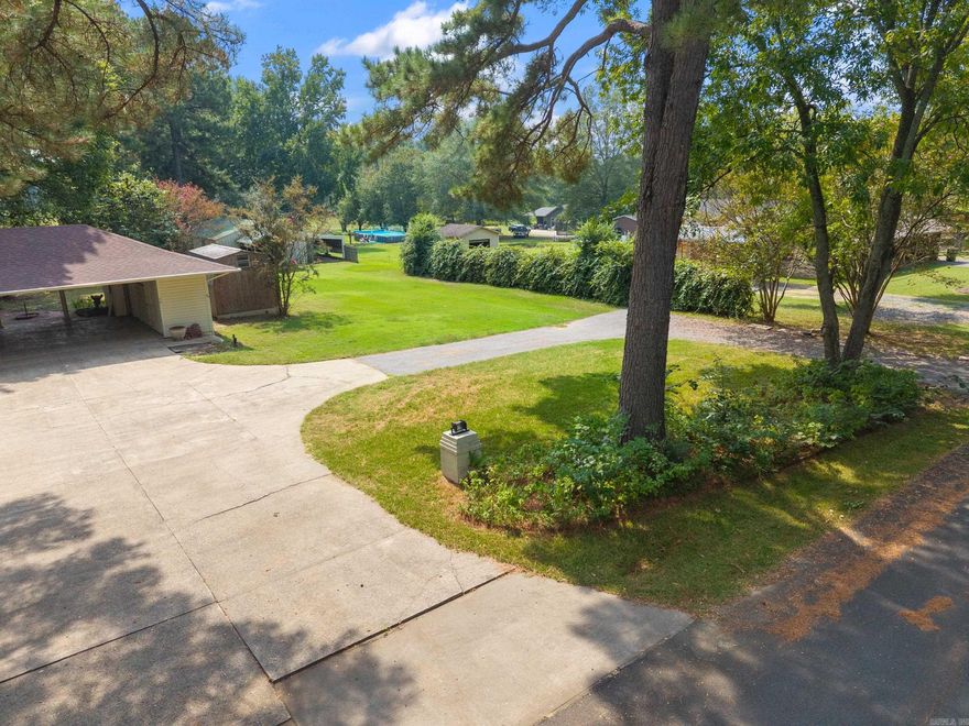 This beautiful 2101 square foot home offers a blend of classic character and modern updates. Built in 1978, the property has been thoughtfully maintained and improved with major updates, in including a new roof (2022) and a new HVAC system (2022). The kitchen is enhanced with a refrigerator that's just a year and a half year old.  Inside, you'll find charming details such as pocket doors, a bay window, and vaulted ceilings in the great room, adding both charm and spaciousness. The wood floors and storm doors further complement the home's inviting design.  Home sold as is.  The property sits on nearly a full acre (.92 acres) and offers exceptional outdoor amenities. A large 35' x 40' shop with power, metal roof, and metal siding provides ample space for hobbies, storage, or work. The shop also includes a lean-to with concrete slab floors for additional functionality. An Active well on the property adds future value and independence.  This home combines comfort, space, and utility--making a standout opportunity. (Agents! See Confidential remarks)