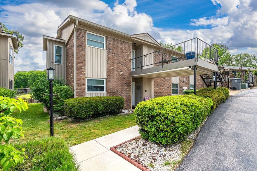 Walk-in level Lake Hamilton condo with unobstructed views, covered boat slip, and zero-step entry. Enjoy effortless lake living in this beautifully positioned end-unit overlooking the water from a protected cove. Designed for both comfort and accessibility, this single-level condo offers easy, everyday living with a well-planned layout. The spacious kitchen, living, and dining area flows seamlessly, creating an inviting space to relax or entertain while taking in the view. The generous primary suite features double closets, and the walk-in custom tile shower enhances the home’s accessible design. A former patio has been thoughtfully enclosed to create a sunroom currently enjoyed as an office and peaceful retreat, perfectly positioned to capture the water view. Residents of Westport Bay appreciate the gated entry, covered parking, all-brick construction, close proximity to the bypass, easy access to the water, and desirable cove location just off the main channel—offering the perfect balance of convenience and lakefront tranquility.