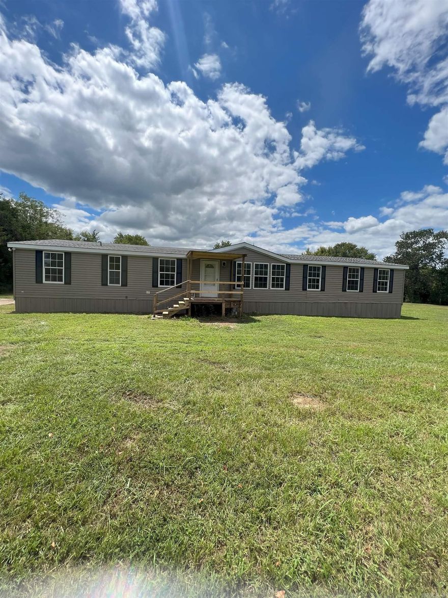 Looking for a country home close to Mt. Vernon-Enola Schools? This is the one you've been looking for! Located right next to the school ballfield, this manufactured home is on permanent slab foundation & has been completely remodeled; new paint, carpets, LVP flooring, roof, HVAC upgrades, new fixtures, & granite kitchen sink. Excellent space buy for the price!  Update-Price Drop of $8000 on 9-14. Home needs a few minor repairs and several new windows. Home is being sold as-is; no repairs will be made. Inspection report online. Hurry before this one sells!