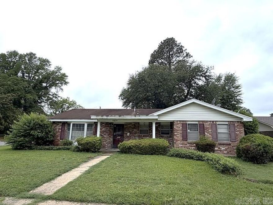Located in an established area of Pine Bluff, Arkansas, this property offers an opportunity for buyers looking to take on a renovation project with potential for personalization and long-term value. The layout begins with a foyer entry leading into the formal living area, while the kitchen connects through the laundry room to the backyard. A secondary living space just off the kitchen provides additional flexibility and direct outdoor access. The hallway includes a guest bathroom, two bedrooms, and a primary suite with a private full bath. Interior finishes and condition will require updates and repairs, creating an opportunity for buyers to redesign and improve the space to fit their needs and preferences. Convenient access to local amenities, employment areas, and major roadways supports both everyday living and investment potential. With a functional layout and room for improvement, this property presents a chance to create value through thoughtful updates and restoration.