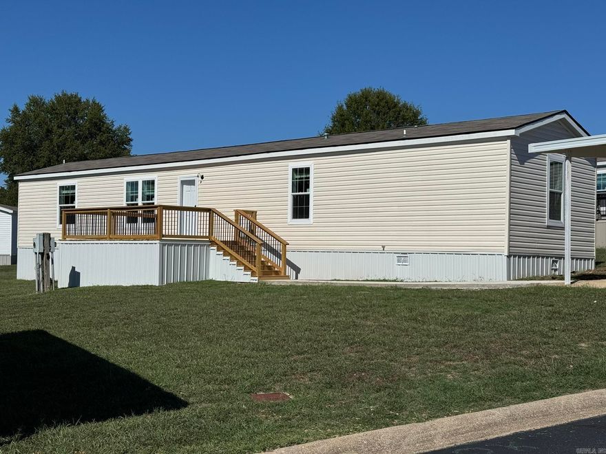 ENJOY 55+ LIVING IN THIS WELL-DESIGNED WELL BUILT 2025 MODEL 3 BEDROOM/2 BATH HOME SITTING ON A SPACIOUS LOT, WITH AN AWESOME OPEN FRONT AND REAR DECK. TWO CAR PARKING UNDER A COVERED CARPORT. THE HOME IS CONSTRUCTED WITH 6 INCH WALLS, DRY WALL INTERIOR WALLS, PLUS EXTRA INSULATION & EASY TO MAINTAIN QUALITY VINYL CLIP FLOOR COVERINGS. INSIDE YOU WILL FIND AN OPEN FLOOR PLAN WITH A WELL-DESIGNED & EQUIPPED KITCHEN WITH UPGRADED STAINLESS-STEEL APPLIANCES. TWO GUEST BEDROOMS & GUEST BATH. PLUS, A SPACIOUS MASTER BEDROOM & WELL-DESIGNED MASTER BATH, WITH A WALK-IN CLOSET. THE PARK OFFERS LAWN CARE, SNOW REMOVAL, WALKING TRAILS, A SWIMMING POOL, A COMMUNITY CENTER WITH WORKOUT EQUIPMENT & KITCHEN. LOCATED ONLY A FEW MINUTES FROM THE FAMOUS WHITE RIVER, THIS HOME IS A REAL FIND.