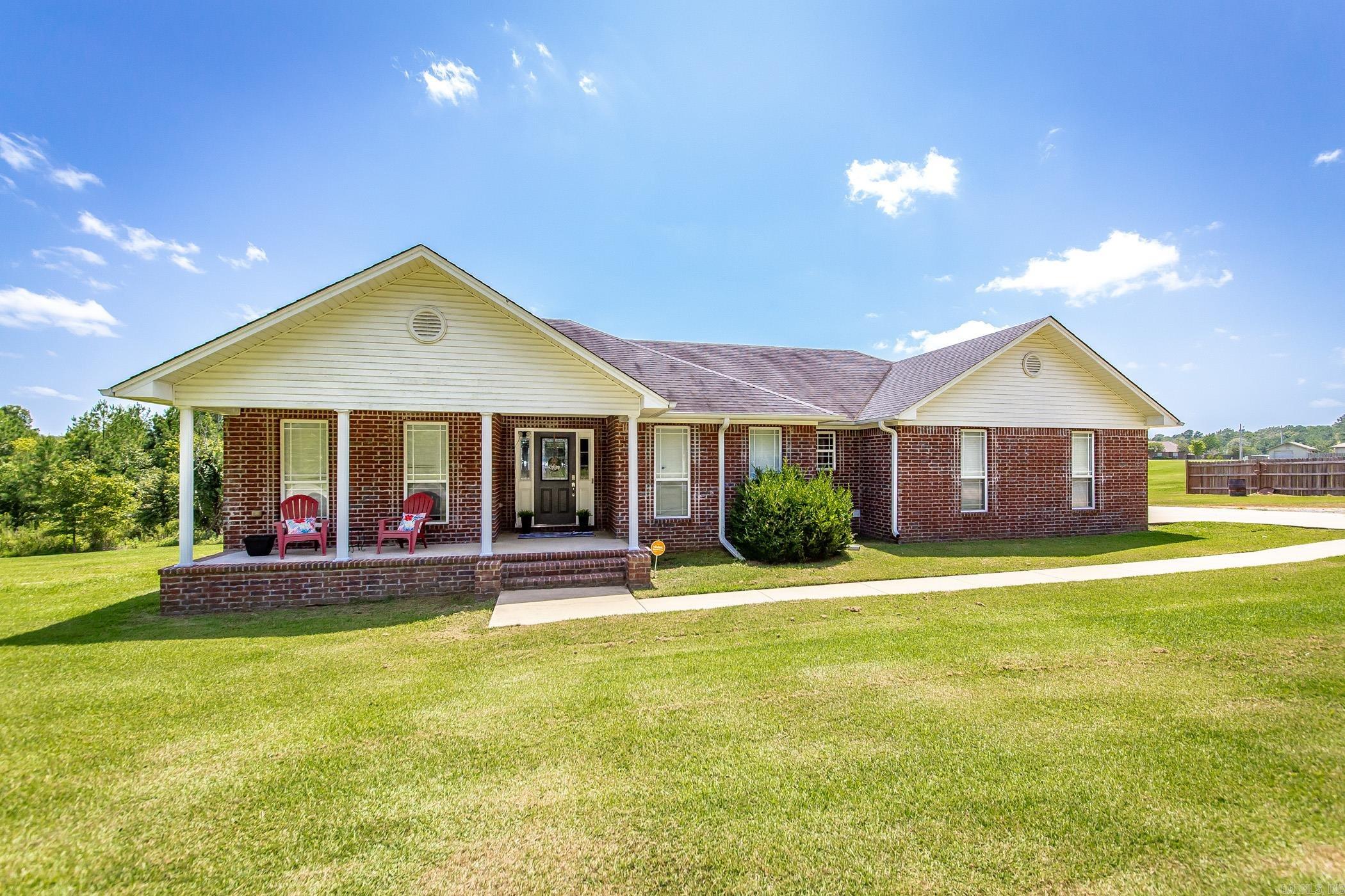 If you are looking for a home on over 3 acres with a shop, NEW HVAC, NEW hot water heater, just minutes from downtown Little Rock, then look no further! As you step onto the welcoming front porch and enter the home you will find a double tier tray ceiling complete with LED accentuating lighting in the living room as well as a wood burning fireplace. You also will find a separate dining room that enters into the kitchen and eating space, laundry, and two additional bedrooms with bath. On the left side of the house sits the master suite complete with additional tray ceiling, double vanity spaces, private water closet, walk in closet, jetted bathtub, and separate shower. Going back into the main living area you will find access to the large covered patio with additional deck space overlooking the beautiful and serene land. You will also find the 24x30 workshop complete with built-ins! The Seller also installed new gutters, downspouts, garage door springs, and dishwasher! For more information contact the listing agent and schedule your showing today!