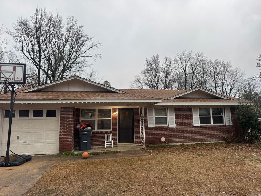 Great opportunity here! Brick home located on corner lot with so much potential! There is a sweet add on that makes up the master bedroom. 4 bedroom 2 bath, conveniently located. Property being sold AS IS- call or text today for a tour!