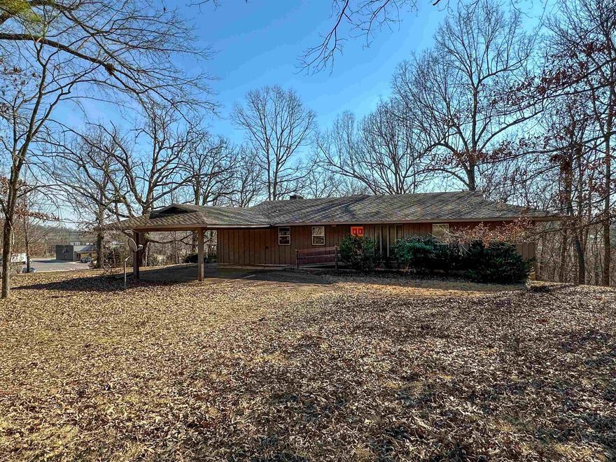 Great Potential and Room for Growth in this large 3 bedroom, 3 bathroom home with finished basement situated on 3 acres on Hackney Creek.  The upper level features a large family room with vaulted ceiling, fireplace, ample natural light, a sunny kitchen, office, and utility room. Large and spacious master en suite with walk-in closet and private bathroom as well as a nice sized guest bedroom.  The basement has one completed bedroom and bathroom as well as a potential extra bedroom.   Extra large finished bonus room with small kitchenette would make a great guest quarters or room for entertaining. All of this is located in a prime location in Ash Flat, Arkansas close to Walmart, restaurants, doctors, and more!