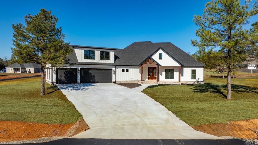 AMAZING HOME! This new construction home has it all! Living Room is vaulted. Even the back and front porches are vaulted with tongue and groove wood in the vault. The kitchen has loads of storage and a walk in pantry hidden by cabinetry. All of the cabinetry in this home is custom. Quartz countertops throughout, custom shower, soaking tub. From the primary bathroom you can walk into the closet and into the laundry room. All bedroom closets in the home are walk in. Lockers for coats, shoes and backpacks as you come in from the oversized garage. Storage room in the garage. Three car garage! This home is fabulous! Road will be paved at the end of October