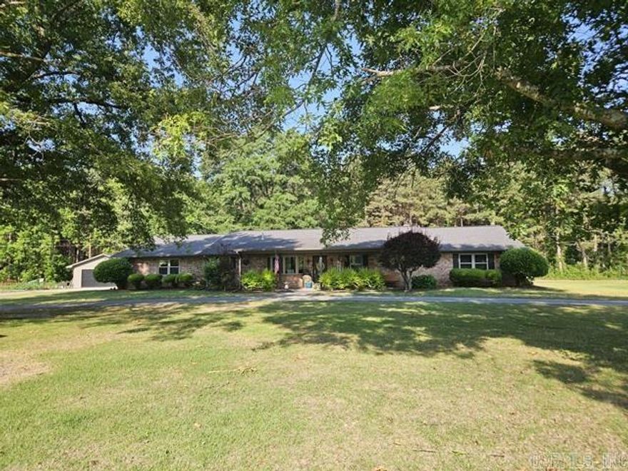 Nestled on 2.21 beautifully landscaped acres, this stunning rural property offers the perfect blend of comfort, space and outdoor living! Built in 1997 and featuring approximately 2,852 sq, this gorgeous home includes 3 bedrooms, 2 full baths, and 2 half baths with an inviting layout designed for both everyday living and entertaining.  Step inside and enjoy the warm welcoming living area highlighted by a beautiful gas log fireplace, formal dining room, spacious den area, and a large kitchen with abundant counter space, dimmer lighting, breakfast bar. The kitchen updates- dishwasher (2018), refrigerator (2022) and gas stove (2023).  The home feature a convenient laundry room/washroom area and large pantry.  Outside, you will fall in love with the backyard oasis that features a fenced inground pool, with liner less than 4 years old, outdoor TV and the Big Green Egg that also remains with the property- perfect for entertaining family and friends. A built-in bug sprayer system around the pool areas help keeps the insect away so you can enjoy your outdoor space comfortably all season long.  Generator, Corner Lot, Detached 2-car garage and so much more.  New Heat/Air 2023, New Windows