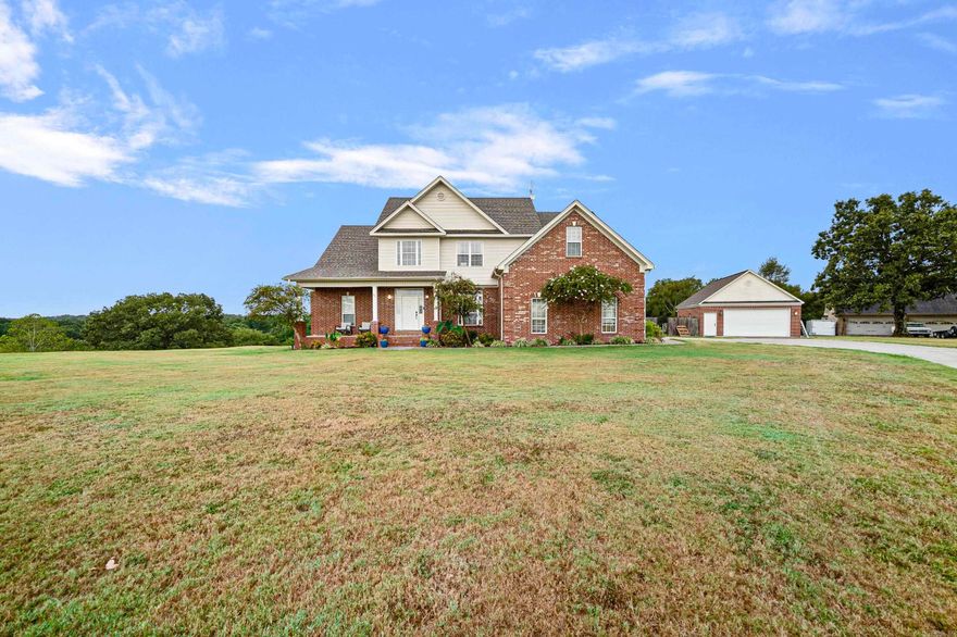Spacious 5-Bedroom Home with Pool & Acreage in a Desirable Subdivision Discover your dream home in this stunning five-bedroom, three-bath, 3,100 sq. ft. residence set on 2.46 acres at the end of a quiet cul-de-sac. With an ideal two-story layout, this home offers three bedrooms upstairs and two downstairs, providing flexibility and privacy for every lifestyle. The fifth bedroom doubles perfectly as an office for those working from home. Step inside to find large bathrooms, a welcoming dining room, a bright eat-in kitchen, and a spacious laundry room designed with convenience in mind. Outdoors is just as impressive, featuring a 20x36  in-ground swimming pool, covered back porch, and breathtaking views—perfect for entertaining or simply relaxing. A detached shop and two-car attached garage add practicality, while the serene acreage provides both privacy and neighborhood appeal. Homes like this in such a desirable subdivision don’t come along often. Don’t miss your chance—schedule a showing today!
