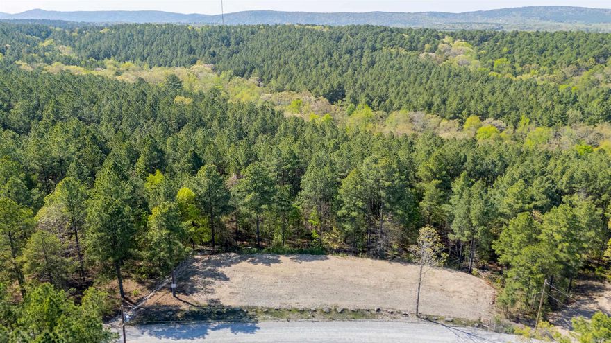 BUILD YOUR DREAM HOME ON 3 ACRES IN PRIME LOCATION. EASY ACCESS TO HOT SPRINGS VILLAGE THROUGH GLAZYPEAU GATE--ASK ABOUT HSV PRIVILEDGES FOR THE BEST OF BOTH WORLDS! COVENANT PROTECTED AREA WITHOUT HOA FEES! HORSES ALLOWED! TRACT 15 & 17  NEXT DOOR ARE ALSO AVAILABLE FOR A TOTAL OF 9 ACRES IF DESIRED. ALL TRACTS HAVE A LEVEL DIRT PAD IN FRONT TO JUMPSTART YOUR BUILDING PROCESS.