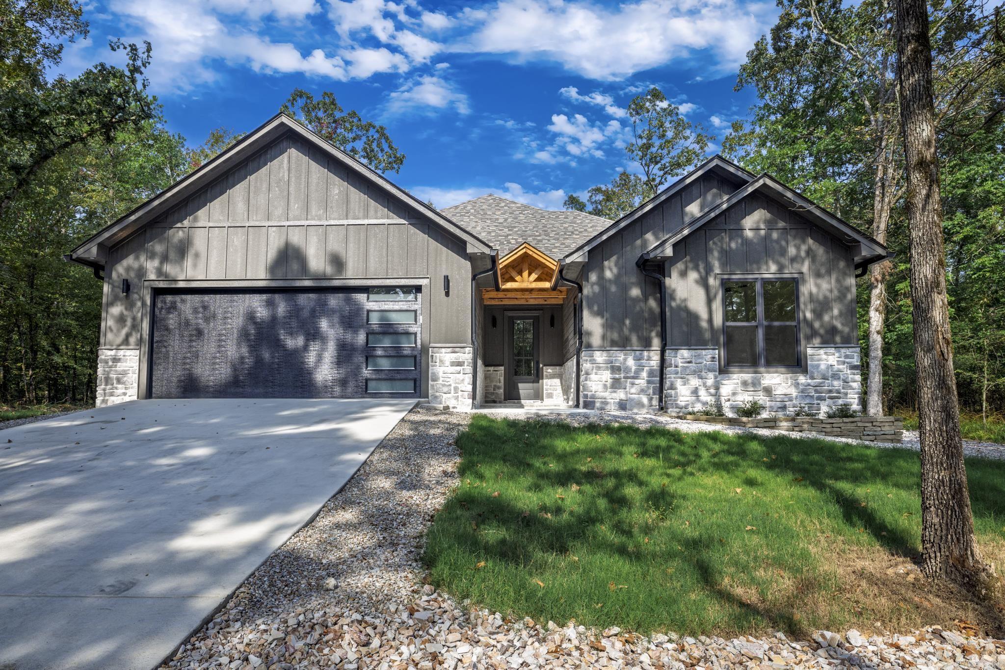 This Beautiful new construction is Ready for move-in This spacious 3 beds and 2.5 baths home features lots of windows to bring the outdoors in. The kitchen is ready for the chef of the home with a 5 burner gas cooktop and is laid out perfectly for gatherings of friends and family. It includes custom wood cabinetry that extends all the way to the 9ft ceiling and a large walk in pantry. The laundry room connects to the primary closet and suite for maximum functionality. Luxury vinyl flooring throughout and custom tile work in your bathrooms. Your back porch comes equipped with a gas fireplace for year round enjoyment! Centrally Located near several golf courses and lakes, restaurants, fitness center, Tennis and more!