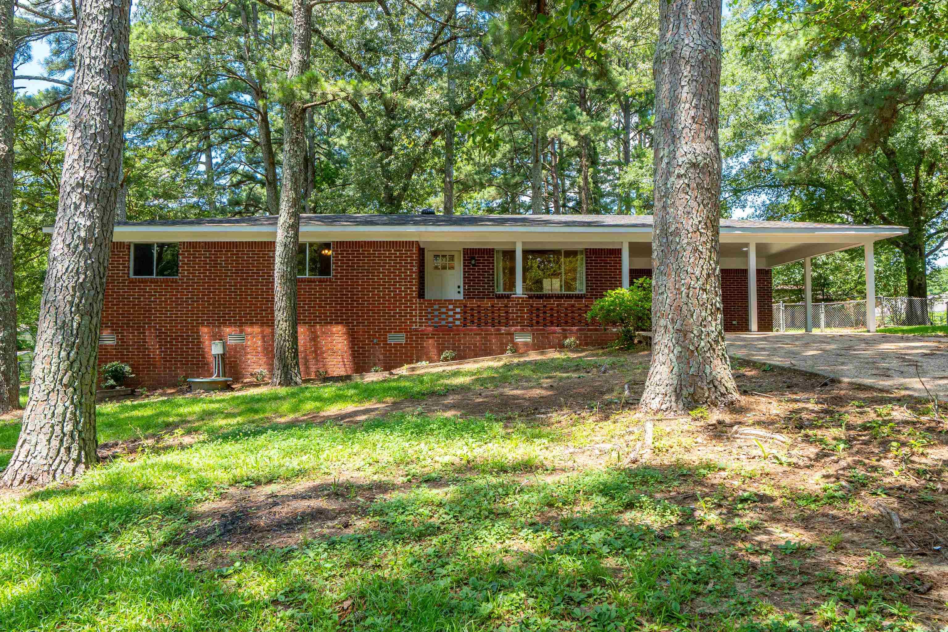 Move in ready! Lots of updates. All brick, one story ranch in Lake Hamilton School District. New roof 2023. New sub-floor in kitchen, laundry and bathrooms 2023. Butcher block kitchen countertops. Appliances stay. Water heater 2024. New interior and exterior doors 2022. Master bathroom updated 2022, guest bathroom 2025. Premium vinyl planking throughout 2022. Exterior paint 2025. HVAC blower motor replaced 2022. New smoke detectors. Covered back patio. City repaved road 2024.