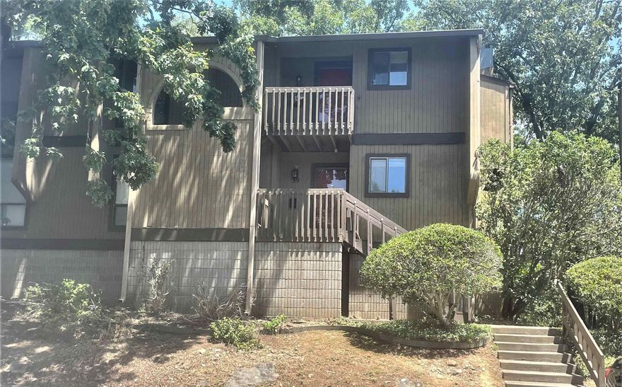 Beautiful 2 bedroom, 2 bath condo in West Little Rock! New luxury vinyl flooring! Gorgeous granite counters in kitchen and bathrooms! Refrigerator, washer and dryer are all included! Beautiful views from the living area and master suite with sliding doors walking out to the covered balcony. Spacious living area with wood-burning fireplace open to the dining and kitchen. Updated bathrooms with large walk-in shower and shower/tub insert. Large closets & 2 additional linen closets for plenty of storage space! 3rd sliding glass door from the living area with additional covered balcony and outside storage closet. Close to shopping, schools, churches and the interstate for an easy commute! HVAC was replaced in 2018. POA just replaced the roof.