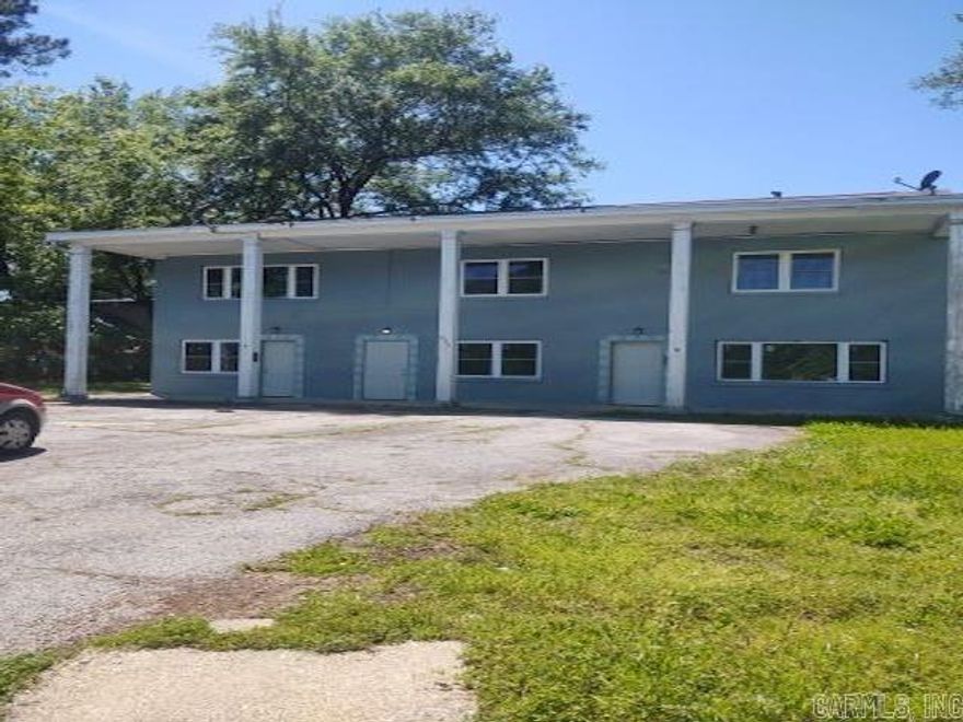 633 4th Street is a rare multi-stream income opportunity in the heart of Hot Springs. This versatile property offers four separate income streams, or the option to house hack by living in the updated two-bedroom detached home while the three additional units generate steady cash flow and help accelerate equity growth.  Recent renovations make this a low-maintenance, turnkey investment. Upgrades include: All new windows. Fresh interior and exterior paint. New flooring throughout. Mini-split systems for efficient heating and cooling. A new water heater in the tri-plex.  The property sits in a prime location near major Hot Springs attractions, employment centers, and amenities—ideal for strong tenant demand and long-term appreciation.  Whether you're expanding an established portfolio or securing your first investment, 633 4th Street offers the kind of flexibility, cash flow potential, and updated condition that investors look for. It’s a smart addition to any strategy focused on building wealth through real estate.