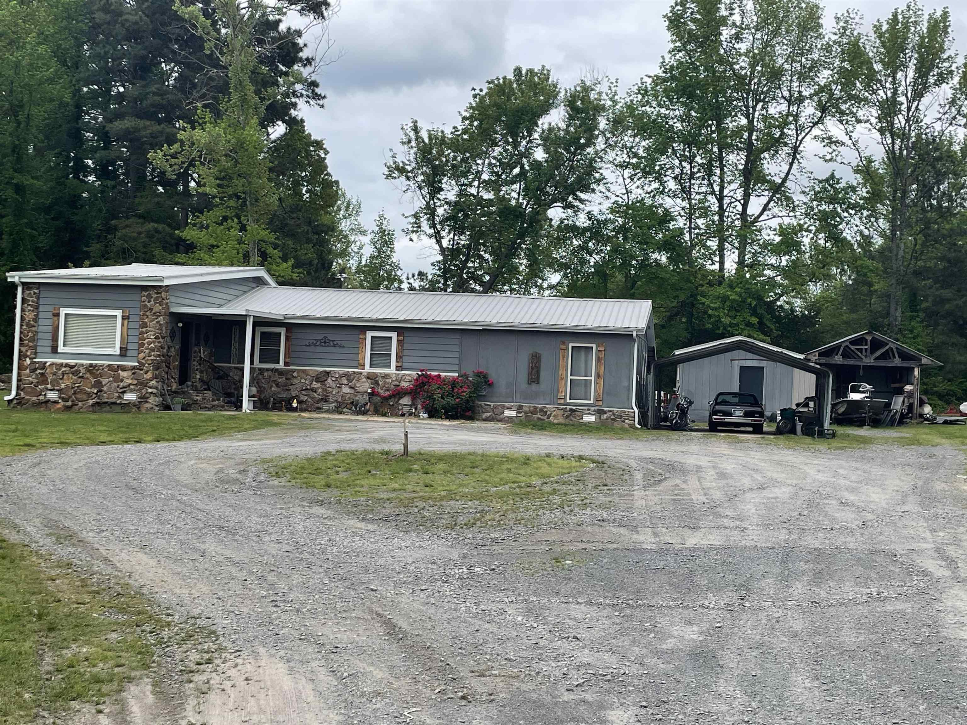 Come check out this Beautiful 3 bed 2 bath house in Greers Ferry located less than 2 miles from Shiloh Marina on Greers Ferry Lake. This .80 Acres features a beautiful creek and a circle drive with plenty of parking. This property would make a great Airbnb or a nice home. No restrictions. Come Schedule a showing today!!!