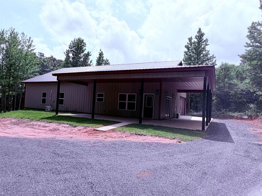 Beautiful country home & 2072sf "Barndominium" (4BR/2BA) on 2.0 acres and house sits in back & a long circular driveway. Offers: 2x6 walls, foam insulation throughout the house, open floor plan, 16ft vaulted ceiling in Living Room with recessed lights, Mini Splits, electric fireplace, electric tankless water heater, granite countertops, moveable island, large Walk-In pantry, UV Filtration System for Well Water, 328sf garage side-load garage with concrete driveway, covered back porch deck 12x12,  and gutters to be installed soon. Agents see Remarks.