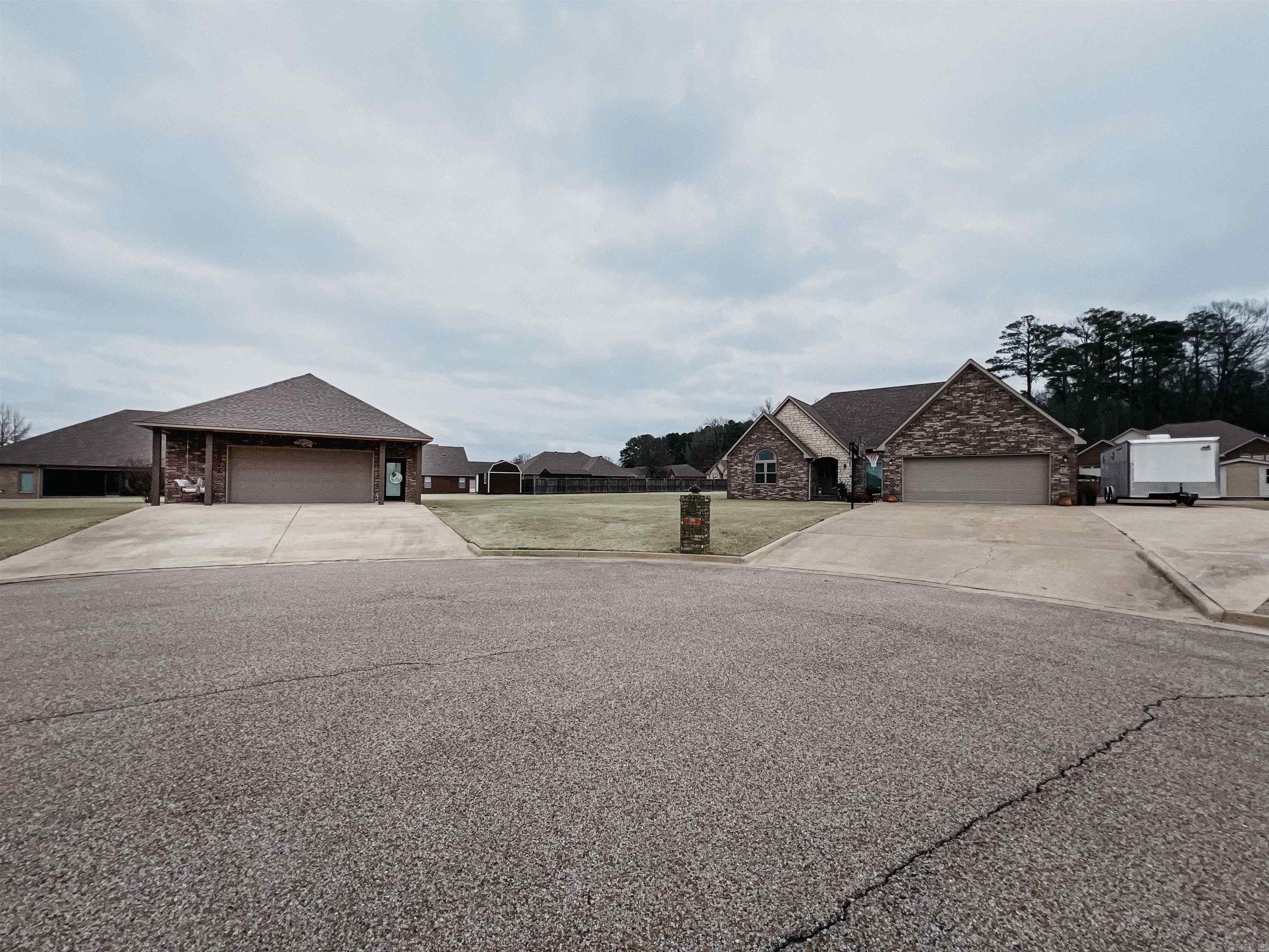 A Rare Find in Fox Crossing! Looking for space, comfort, and convenience? This beautiful brick and stone home checks all the boxes! Situated on a rare double lot, you'll enjoy nearly three-quarters of an acre, tucked at the end of a private cove in the peaceful Fox Crossing Subdivision. This well-maintained 3-bedroom, 2-bathroom home with a whole-home generator, boasts an open floor plan, perfect for family living or entertaining. The spacious kitchen features a breakfast bar and breakfast room, plus a formal dining space for those special meals. The grand primary suite is a true retreat, with a large bathroom featuring a separate tub and shower, double vanity, and a generous walk-in closet. The guest rooms are oversized with plenty of storage. And, if you love having extra space, the additional lot is a huge bonus! It includes a fantastic garage/shop built to match the home, complete with high-end finishes, great built-ins and even a half bath. For outdoor lovers, youāll love the direct access to a 2-mile walking path right outside your door! Whether youāre enjoying peaceful walks or hosting gatherings, this property offers it all! Call or TEXT Today!
