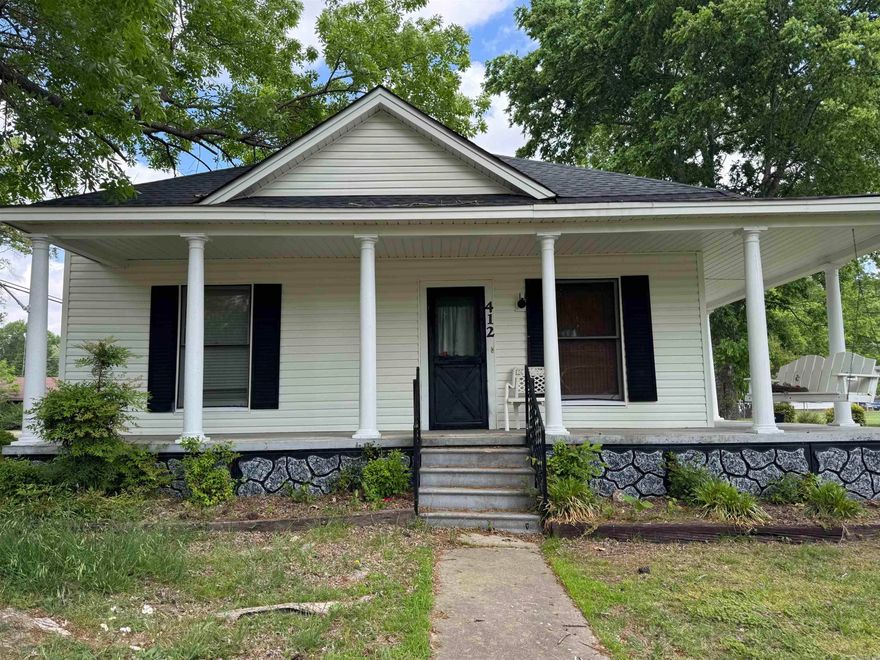 Charming 1960's home located within the city limits of a welcoming small town known for its excellent school system. This spacious 3-bedroom, 2-bath residence offers timeless character paired with key modern updates, including a newer roof and HVAC  for peace of mind. Situated on a desirable corner lot, the property features a large wrap-around porch-perfect for morning coffee or evening gatherings-surrounded by mature shade trees that provide beauty and comfort year-around. With generous outdoor space and classic appeal, this home offers the perfect blend of small-town charm and everyday convenience.