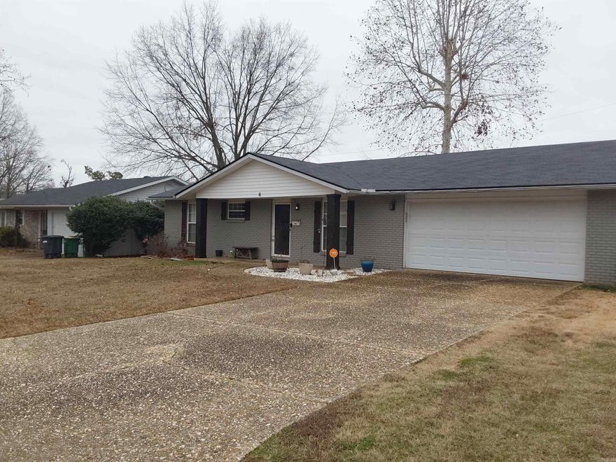 Check out this super cute home! Painted brick with stained cedar shutters and stained cedar posts. This home features three spacious bedrooms, two full baths, a wood burning fireplace, a great kitchen with with new granite and newly painted cabinets. Nice flooring throughout the home, carpet in the bedrooms. Great fenced in backyard with a large storage building. Fantastic amenities also include a new roof in 2023, gutters, and a two car garage. Come check out this great house! It won't last long!