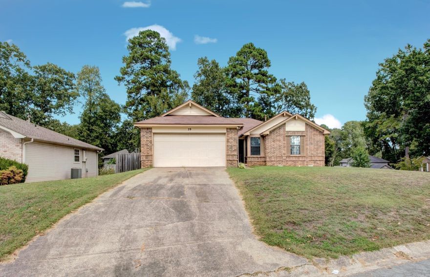 Lovely Home in the Otter Creek Community! This corner lot 3 BR/2 BA home is illuminated by skylights and transom windows! Main living areas feature wood flooring with new tile in the baths. The large eat-in kitchen features beautiful granite counter tops with great storage. The spacious great room and dining area feature a WBFP/w brick hearth. The large Master suite with built in cabinetry, features an updated custom bath. Relax & entertain on your covered deck over-looking a fenced yard! Come see!