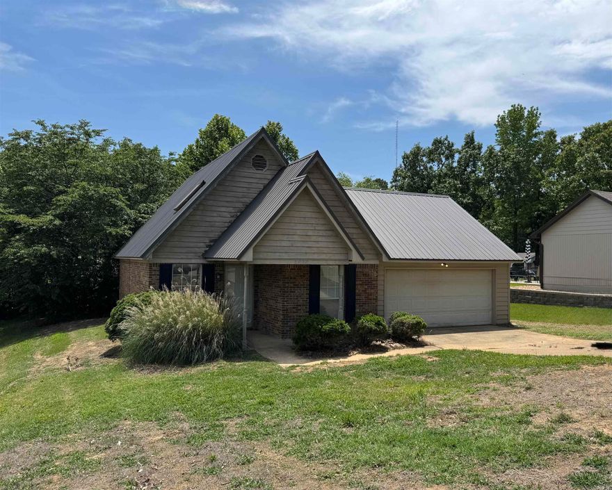Two story bungalow with a new metal roof in Valley View school district