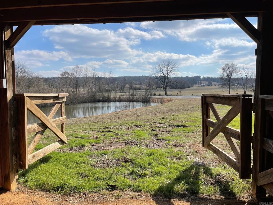 Enjoy cleared pasture land with multiple amenities. 2 ponds, 2 barns and chicken coop. Well and storm shelter on site. Endless opportunities to do whatever you would like with this property. Multiple building sites make it perfect for your next home, development or farm with plenty of room to graze cattle. Close to the conveniences of town while still private. No mineral rights convey. No mobile homes.