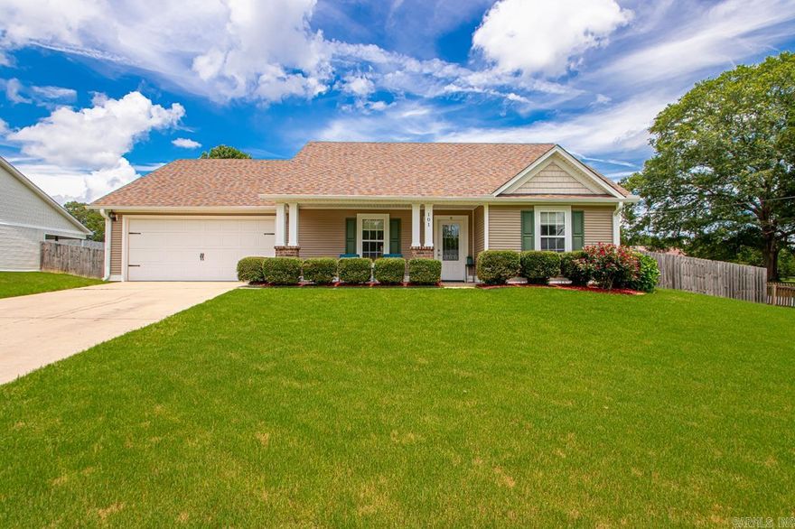 Sound the alarm—this one is move-in ready! Beautifully landscaped and sitting proudly on a spacious corner lot, this 3-bedroom, 2-bathroom home is just minutes from Harmony Grove Schools. Step inside to an open-concept living and kitchen area, complete with ample counter space and room for a dining table—perfect for entertaining or family meals. To the right of the living space, you’ll find two comfortable guest bedrooms with a full bath between them, along with a spacious laundry room offering. On the opposite side of the home, the private primary suite includes a walk-in closet and a walk-in shower. Step out back to your covered patio—ideal for relaxing evenings or weekend get-togethers. The yard is perfectly manicured and easy to maintain, making outdoor living a breeze. Plus, enjoy peace of mind with a new roof installed in 2024. This home checks all the boxes—don’t wait! Schedule your private showing today!