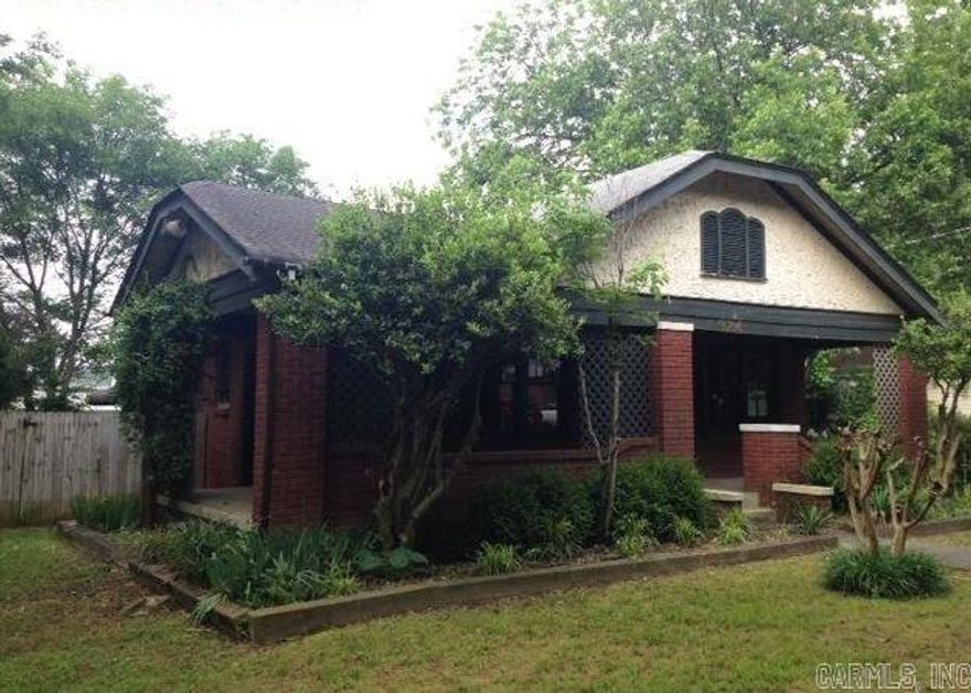 Amazing opportunity for a home with an income property.  Unique home with 2nd detached residence.  Main home has a spacious living area with fireplace, arched doorways and separate dining room.  Property Description/promote property amenities…For information on bidding, Earnest Money procedures and more, visit:  www.HUDHomestore.com .