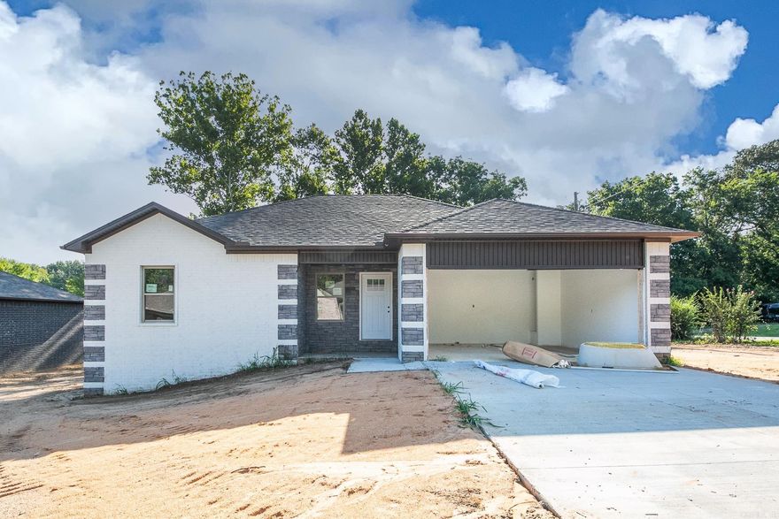 ****The builder is offering a special 2-1 RATE BUY DOWN for qualifying buyers. For more details, please contact the listing agent.**** Welcome to your NEW home! This 3 bedroom 2 bath home is perfect! Open floor plan, big living room. Great counter tops, tiled backsplash, tons of cabinets, stainless steel appliances, dishwasher and built in microwave! Farm Sink! Master bath has a double vanities and tile shower. Home includes a 2 car garage.  All bedrooms are large with great closets and ceiling fans! Wood deck. Call today!