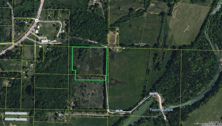 Discover your own private sanctuary on this 9.29-acre vacant land, situated near the picturesque Fourche La Fave River in Boles, Arkansas. Embrace the tranquility of nature and the gentle flow of the nearby river, making this property a haven for outdoor enthusiasts and those seeking a peaceful retreat. With its lush vegetation and some mature trees, the land offers endless possibilities for building your dream home, a charming cabin, or a hobby farm. Enjoy the convenience of essential amenities just a short drive away in Waldron or Mena while reveling in the seclusion and natural beauty of this nice parcel of land. Explore the nearby trails for hiking and ATVing, or indulge in fishing and boating along the river's edge. Don't miss this chance to own a piece of Arkansas paradise and create the lifestyle you've always envisioned. No Easement.