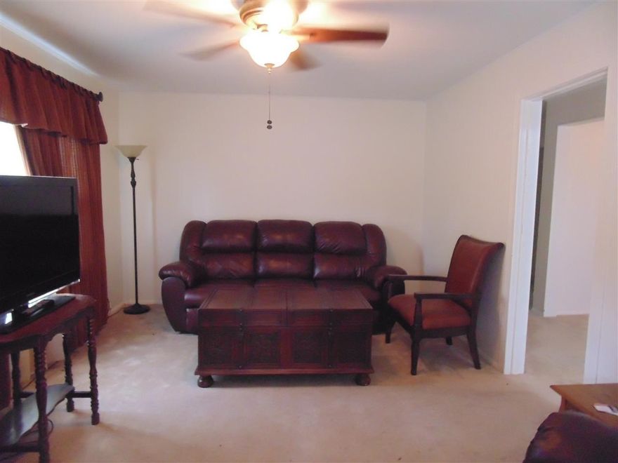 Adorable house hid away and waiting for a new owner.  Anything you see is new from the carpet, kitchen cabinets, appliances, fence, bath, windows, siding....  This list goes on and on.  This home would be a wonderful place for a couple or small family.  This is a property you won't want to miss out on.  Totally ready to move in to.