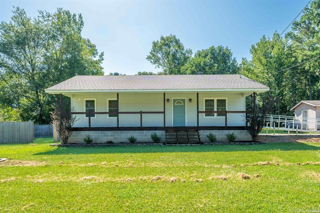 **Charming 2-Bedroom Home Across from Lake Hamilton ā No Restrictions!** Welcome to this **adorable, updated 2-bedroom, 1-bath home** in beautiful **Hot Springs, Arkansas**, perfectly located **just across the street from Lake Hamilton**! Situated on a spacious **double lot with no restrictions**, this property offers endless potentialāwhether you're looking for a **primary residence, vacation home, or short-term rental investment**. Step inside to find a warm and inviting interior with modern updates throughout, including fresh finishes, stylish fixtures, and an efficient layout that maximizes space and comfort. The living and dining areas flow seamlessly into the updated kitchen, creating a cozy but open feel ideal for relaxing or entertaining. Outside, you'll enjoy the perks of **neighborhood lake access**, giving you the best of lake life without the waterfront price tag. With **ample outdoor space** for a firepit, garden, or even future expansion, this oversized lot gives you room to dream and grow. No HOA, no restrictions, and minutes from shopping, dining, Oaklawn Racing & Casino, and all that Hot Springs has to offerāthis gem is **move-in ready and full of opportunity**