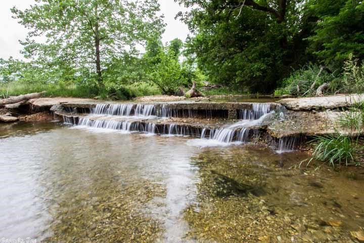 WOW! Hunter or Ranchers dream property. Gated entrance! Clear Creek runs throughout entire property. Glenncoe Spring runs along the side of property. Cave, springs, pasture land, hay fields, numerous ponds, 40' x 120' Pole Barn. Corrals, loading chutes, medicine and feed room. Deer paradise. Lots of wild turkey and quail. Cute 2 bedroom farmhouse, with well water. Fruit orchid. Could easily have a private airstrip. 2 mi from US Hwy 65. 10 miles from Buffalo National River. This property is a must see!!