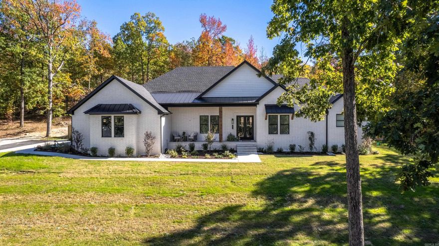 Beautifully modern home built in 2022. Your own piece of serenity nestled among 2.34ac of tree studded land just minutes from town. You'll fall in love with the high ceilings bright white walls and natural wood features throughout the home. Built for entertaining, the open kitchen, living and dining are perfect for large family gatherings. The family chef will enjoy the gas stove, granite counters and hide away pantry. Relax in the sunroom with views into the fully fenced back yard or retreat to the master en'suite with oversized walk in shower for2 and walk in closet with built in storage. The attic is floored and extra insulated for additional storage of memories gone by. A three car garage for all your big toys rounds out this lovely home and makes it perfect for your family. Priced to sell quickly, call for your private tour before its gone.