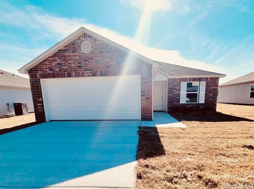 The classic Wright plan! This plan has a large good sized Living Room leading to an open Kitchen which opens onto a covered back porch. All bedrooms are on the same side of the home.   Special upgrades in this home: 60" fiberglass stand up shower in Master Bath, plumbing faucet upgrade Level 2, 16" laminate bar top in Kitchen, Luxury Vinyl Plank flooring in wet areas, Cheyenne style interior doors throughout, LED disk lights in Kitchen.   THIS HOME IS SCHEDULED TO BE COMPLETE IN LATE OCTOBER.   Springlake Trails is moments down the road from East End Middle School. This home comes with a 2-10 Home Buyer's Warranty with $0.00 deductible.