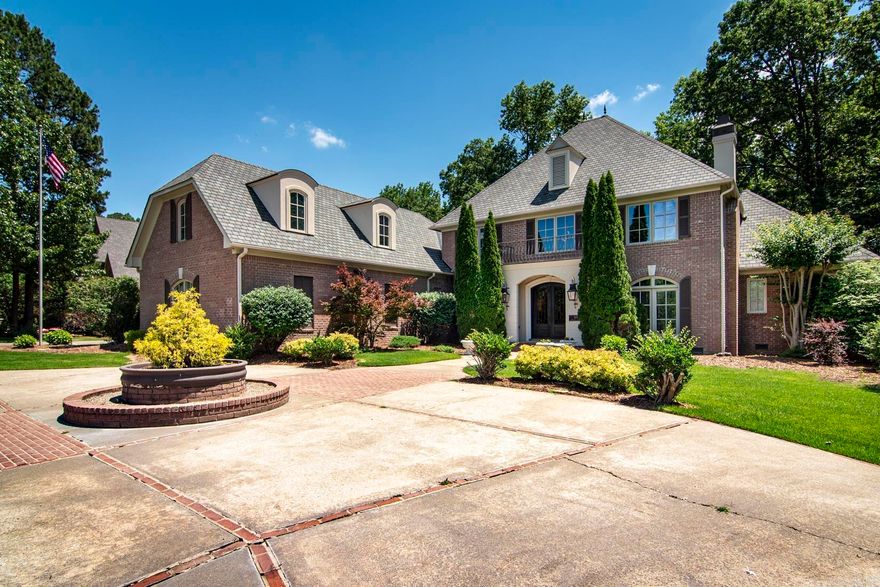 Exceptional Custom Home by Carl Gray Hinson in Prestigious Sologne Nestled on a beautifully landscaped, three-quarter-acre corner lot, this outstanding custom home is located in Sologne—one of Chenal’s most sought-after neighborhoods. Backing up to protected greenspace, this residence offers privacy, elegance, and timeless architectural design. The gracious main level features two spacious living areas, a formal dining room, and an eat-in kitchen perfect for entertaining or casual gatherings. The luxurious owner's suite is a true retreat, complete with a spa-like bath for ultimate relaxation. Upstairs, you’ll find three generously sized bedrooms, a large recreation room, and a versatile bonus room ideal for a home office, gym, or hobby space. Enjoy serene views from the wonderful, covered porch that overlooks the lush greenspace, offering a tranquil outdoor living experience. Additional highlights include a three-car garage with extra storage space and meticulous landscaping throughout the property. Opportunities to own a home of this caliber in Sologne at this price point are rare—don’t miss your chance to make it yours.