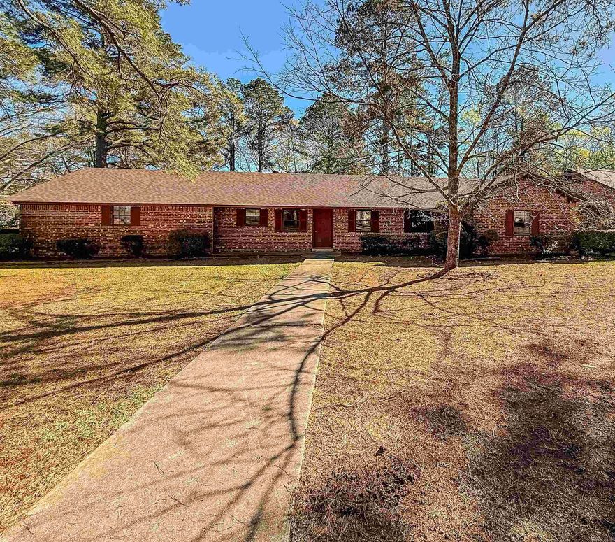 Homes in this neighborhood rarely hit the market! This 4-bedroom, 2-bathroom home is ready for your personal touch. You'll love the walk-in closet, dining/office space, cozy living room fireplace, covered back porch, and LARGE storage shed for extra space. With the split floor plan and open concept, this home was truly built before its time!