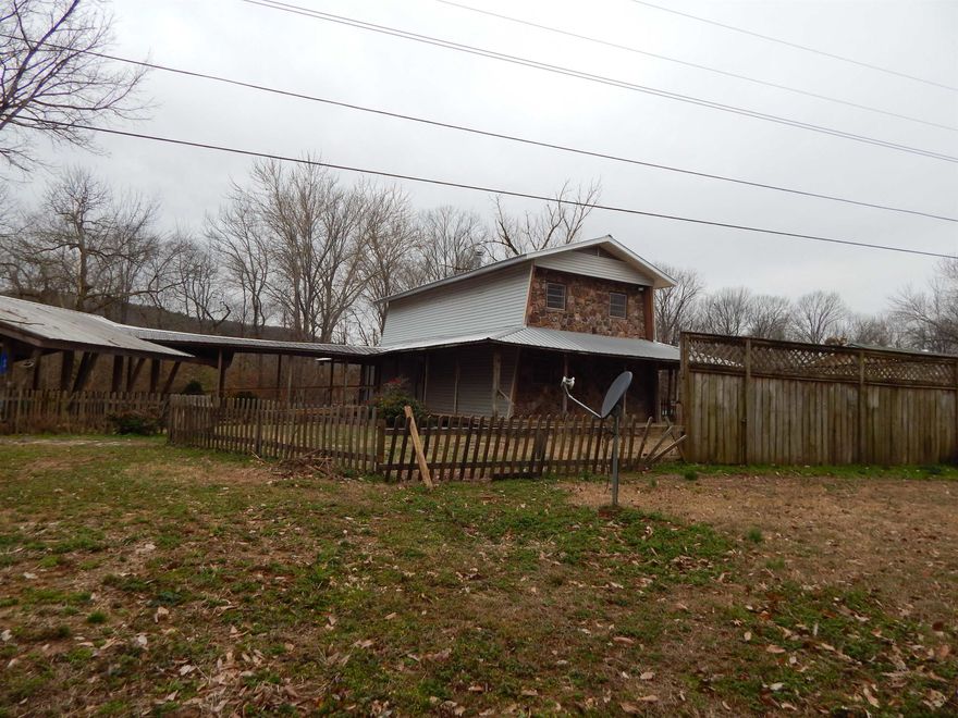 What an affordable home on the river.  Large boatdock.