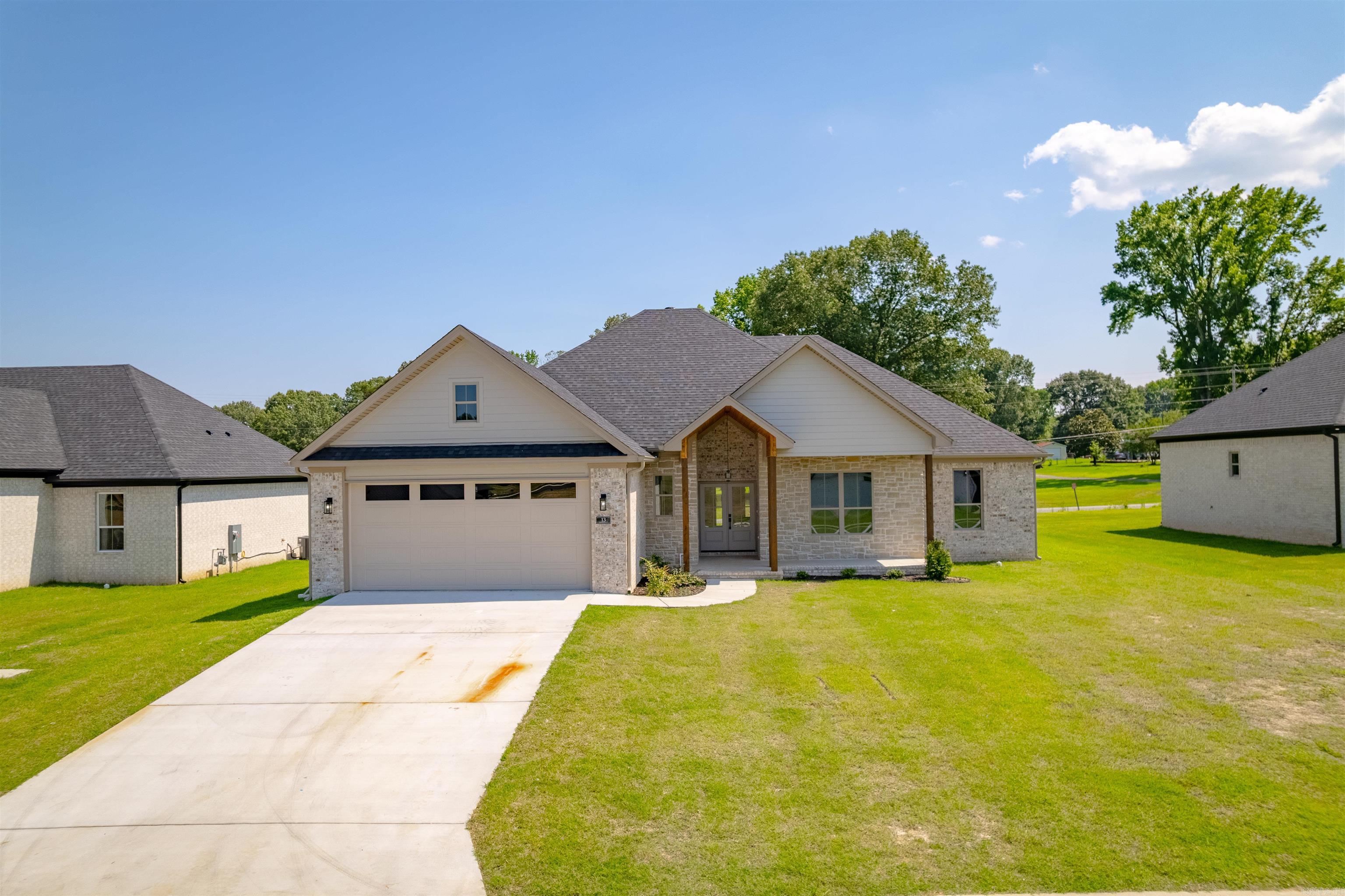 This is a stunning 4 bed, 2 bath home in the Windridge Subdivision, right outside of Cabot. This home has custom tile and trim throughout the home, with modern accents throughout the home. When you enter the home from the double front door, you will enter the foyer. From there the Living Room and guest rooms and guest bath are on the right. Kitchen, laundry and Master Bedroom are to the left. This is a very spacious, open floor plan. Master Bathroom has a walk in shower and a stand alone soaking tub that's perfect for relaxing after a long day. Kitchen has a hidden pantry, gas stove and island that is perfect for entertaining family and friends. Large laundry room with stunning cabinets and countertop. This home also has a tankless water heater, so no more arguing over who used the last of the hot water! SEE AGENT REMARKS