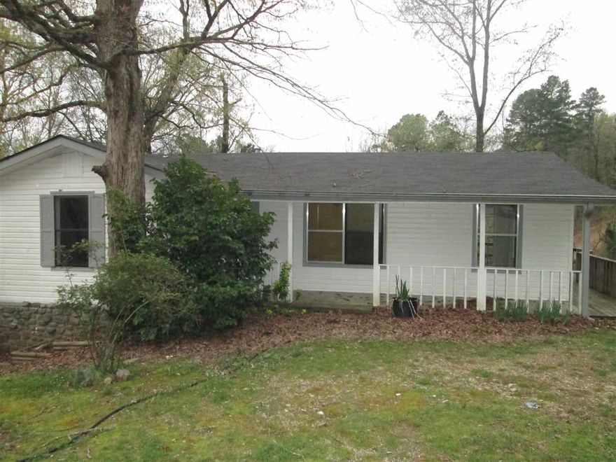 Great Starter or Family Home! This one is a great opportunity. It was remodeled in 2010, but needs cosmetic retouching. Lots of upgrades. Roof was recently replaced, including the decking. Newer heat and air, and new water heater. Electrical has been upgraded. Storm windows.  Flooring or repair allowance will be considered with a full price offer. The downstairs bonus room could be used and a 4th bedroom. Decking on 3 sides of the house.  Covered gutters. Priced below assessed market value for a quick sale.