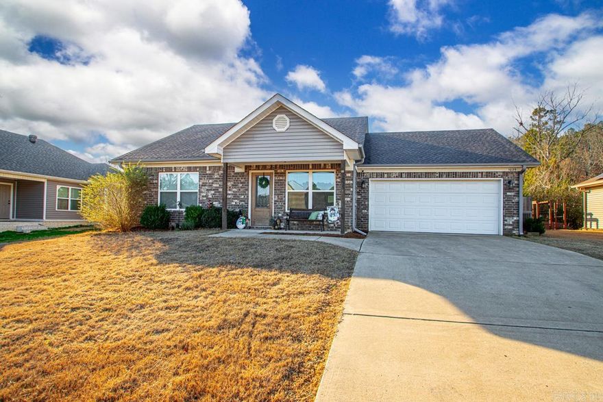 Welcome home to this charming, well-kept house with a thoughtfully designed floor plan that fits every season of life. From the moment you arrive, you’ll appreciate the great curb appeal and inviting entryway. Inside, the spacious living room is perfect for cozying up with friends and family, making it an ideal space for both relaxing and entertaining.  The open-concept kitchen offers plenty of cabinet and countertop space, featuring granite countertops, select stainless steel appliances—including a new microwave—and a spacious dining area. The split floor plan includes a roomy primary suite with a walk-in closet and a tub/shower combo. Additional bedrooms are generously sized with ample closet space, along with a spare bathroom that truly stands out—complete with double vanities, plenty of storage, and a tub/shower combo.  Out back, you’ll find the perfect level, fully fenced backyard, ideal for everyday enjoyment or hosting gatherings. This one checks all the boxes—don’t miss your chance to make it yours!
