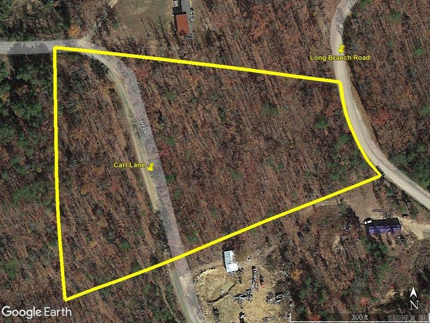 5 acres in the country but less than 3 miles to Hwy 65 and Dollar General. This 5 acre tract has county road frontage on 2 different county roads and one of those county roads splits part of the acreage away from the other which allows for 2 different nice building spots. The land fronts Long Branch Lane on its east side and continues to the west where it fronts Carl Lane on both sides of the road. See the aerial view for clarification. The land is all wooded with water and electric available. Clinton, AR and Walmart is 12 miles away and Greers Ferry Lake boat launch at Choctaw Rec Area is 10.5 miles or Sugar Loaf Rec Area is 12 miles away.